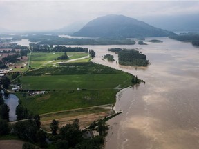 The swollen Fraser River is seen in an aerial view in Chilliwack, B.C., on Wednesday May 16, 2018.