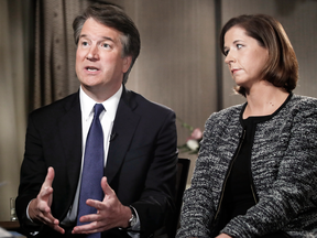 Brett Kavanaugh, with his wife Ashley Estes Kavanaugh, answers questions during a Fox News interview, Sept. 24, 2018, in Washington, about allegations of sexual misconduct against the Supreme Court nominee.