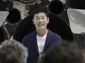 Japanese billionaire Yusaku Maezawa speaks after SpaceX founder and chief executive Elon Musk announced him as the person who would be the first private passenger on a trip around the moon, Monday, Sept. 17, 2018, in Hawthorne, Calif.