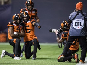 After beating the Hamilton Tiger-Cats in an overtime "photo finish" last week at B.C. Place Stadium, the B.C. Lions look to win the rematch Saturday in Steeltown. Shaq Johnson pretends to photograph Ricky Collins Jr., Bryan Burnham and DeVier Posey after Burnham scored a touchdown against the Ticats on Sept. 22.