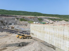 B.C. Hydro is being castigated for secrecy even as it builds the massive Site C hydroelectric project. Here concrete is poured in July for the tailrace.