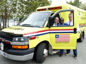 From left: Marjorie Ratel (president Korle-Bu Neuroscience Foundation), Dr. Francis Kateh (deputy health minister, Liberia), and David Sakaki (Kamloops Fire Rescue) with ambulance being sent from Vancouver to Liberia.
