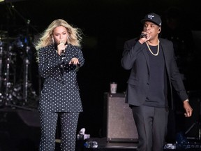 Beyonce and Jay-Z perform during a Hillary Clinton campaign rally in Cleveland in 2016.