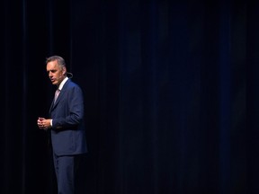 Jordan Peterson delivers a lecture to a large crowd.