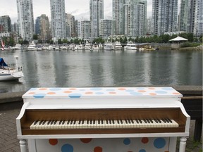 A piano under the Cambie Street bridge 
in 2013.