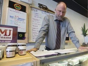 Dana Larsen at his  Medical Cannabis Dispensary in Vancouver. He is among medical cannabis outlets arguing the constitutional rights of patients are being violated because Ottawa left medical consumption out if its legalization of recreational cannabis and the city of Vancouver is making ti too tough for them to operate.