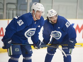 Vancouver Canucks 2018 training camp at the Meadow Park Sports Centre in Whistler, BC Friday, September 14, 2018. Pictured are Jalen Chatfield (right) and Bo Horvat.