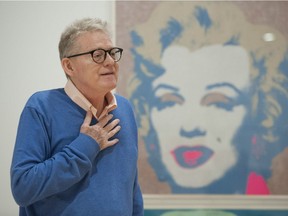 Former Vancouver Art Gallery curator Ian Thom leads a tour of his final curated exhibition A Curator's Eye: Ian Thom Selects. He's shown in front of a print of Marillyn Monroe by Andy Warhol.