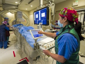 In this file photo, a patient is treated in the Neuro-Angiography suite at Vancouver General Hospital. New findings show endovascular thrombectomy can be effective in treating a highly select group of patients up to 24 hours after signs of stroke first appear.