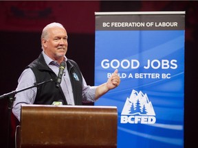 Premier John Horgan was met by a standing ovation at the annual B.C. Federation of Labour's Labour Day rally at the PNE Coliseum on Monday.