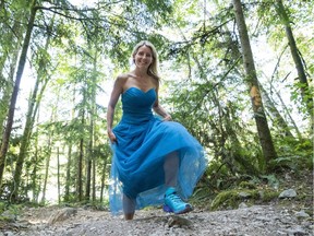 Karen Stark walks up the Grouse Grind while wearing the gown and Salomons she will have on when she climbs with nine of her friends to raise money for KidSport.