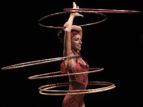 Santé d'Amours Fortunato from Vancouver performs the complex hula hoops and chandeliers acts in Corteo.