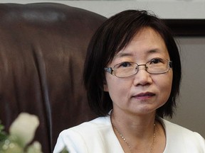 Lawyer Hong Guo in her Richmond office in 2016.