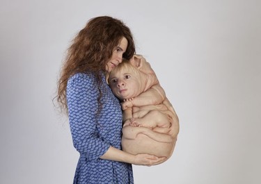 The Bond, silicon, fibreglass, human hair, clothing, by Patricia Piccinini, in Curious Imaginings, Patricia Hotel, Sept. 14 to Dec. 15, 2018. Part of Vancouver Biennale. [PNG Merlin Archive]