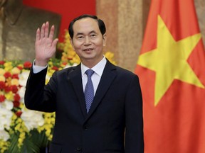 n this March 23, 2018, file photo, Vietnamese President Tran Dai Quang greets journalists as he waits for arrival of Russian Foreign Minister Sergei Lavrov at the Presidential Palace in Hanoi, Vietnam. Official media say Vietnamese President Tran Dai Quang has died at age 61 due to illness on Friday, Sept. 21, 2018.