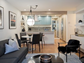 In this West End apartment, designer Kendall Ansell removed a wall blocking the kitchen from the living area, shifted the 
cabinetry to the back wall and installed an island. This opened the space, created better flow and provided more storage.