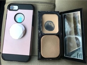 Coalition Vancouver mayoral candidate Wai Young said she received a ticket last year for driving while using an electronic device because a police officer mistook her makeup compact for a cell phone. Both items are pictured here in a photo provided by the party in a news release.