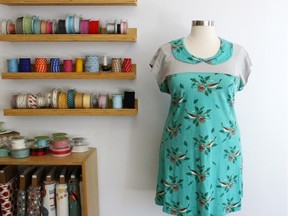 A dress is pictured on display at of Spool of Thread Sewing Lounge.