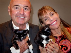 Offleashed gala honorary chair Wayne Deans and Leslie LaVie held kittens in the Cuddle Lounge when the event reportedly raised $600,000 for the SPCA to support abused, neglected, injured and homeless animals.