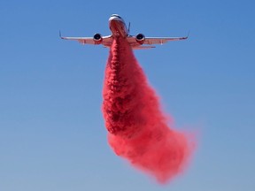 One of the Boeing 737s purchased and retrofitted to fight wildfires by Port Alberni's Coulson Group of Companies during a test flight this year.