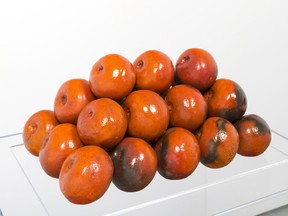 26 Blood Oranges, glazed ceramic, 1970, by Gathie Falk. Photo: Scott Massey for Equinox Gallery. [PNG Merlin Archive]