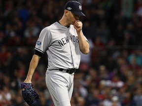 J.A. Happ of the New York Yankees reacts after being relieved in the third inning against the Boston Red Sox in Game 1 of the American League Division Series at Fenway Park on Octo. 5, 2018 in Boston, Mass.