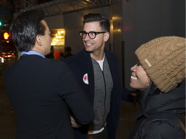 NPA candidate for mayor Ken Sim (left) shakes hands with Hector Bremner (right) of Yes Vancouver prior to the polls closing, Oct. 20, 2018. They bumped into each other on Burrard St.