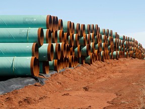 Miles of pipe ready to become part of the Keystone XL pipeline are stacked in a field near Ripley, Okla.