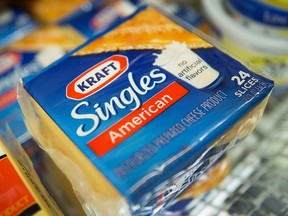 Singles cheese slices are displayed for sale at a supermarket in New York, U.S., on Monday, Nov. 5, 2012.