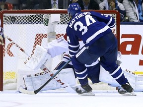 Toronto Maple Leafs Auston Matthews C (34) buries the winner in OT past Montreal Canadiens Carey Price G (31) in Toronto on Thursday October 4, 2018.