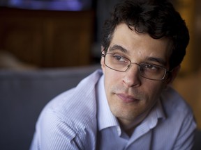 Steven Galloway is pictured in his office at the University of British Columbia in Vancouver on March 31, 2014.