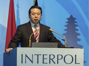 FILE - In this Nov. 10, 2016 file photo, released by Xinhua News Agency, then China's Vice Minister of Public Security Meng Hongwei delivers a campaign speech at the 85th session of the general assembly of the International Criminal Police Organization (Interpol), in Bali, Indonesia.