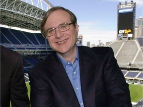 FILE - In this July 17, 2001 file photo, Seattle Seahawks owner Paul Allen appears in a suite in the team's stadium in Seattle. Allen, billionaire owner of the Trail Blazers and the Seattle Seahawks and Microsoft co-founder, died Monday, Oct. 15, 2018 at age 65.