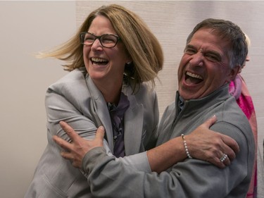 Former City of North Vancouver mayor Darrell Mussatto (right) and newly elected Mayor Linda Buchanan celebrate after getting the election results Saturday night.