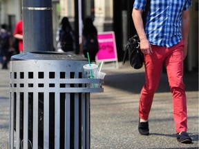 FILE PHOTO: Garbage bins containing coffee cups on Granville St. in Vancouver, BC., June 26, 2017.