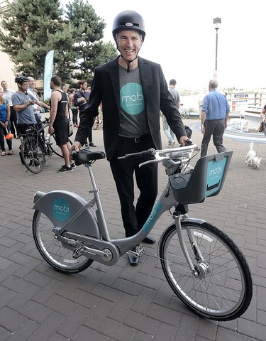 Mayor Gregor Robertson on a shared bike as The City and Vancouver Bike Share launches the first phase of the public bike share program, July 19, 2016.