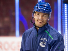Bo Horvat is quick to credit Vancouver Canucks' assistant coach Manny Malhotra, shown, for helping him improve in the facoff dot. Malhotra was one of the best at winning faceoffs during his NHL career.