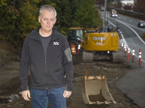 Karl Buhr, mayor of Lions Bay, at a piece of land being rezoned into a single family lot.