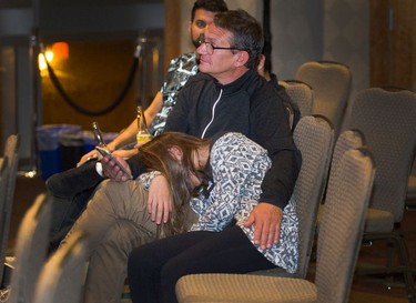 Supporters sit through a long wait at Ken Sim NPA HQ at Coast Coal Harbour Hotel in Vancouver, Oct. 20, 2018.