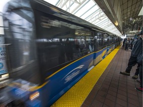 A SkyTrain leaves Surrey Central station.
