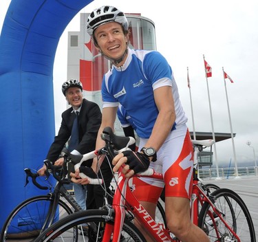 Mayor Gregor Robertson (left) and Canadian triathlete Simon Whitfield at the launch of the RBC GranFondo Whistler on Sept. 11, 2010.