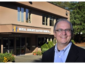 Pastor Alan Braun stands outside the Royal Heights Baptist Church in 2012.