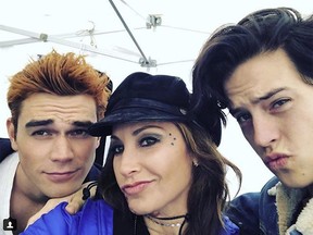 Gina Gershon and Trinity Rose Likins have been cast as Gladys and Jellybean Jones on the locally filmed series Riverdale. Gershon (middle) is pictured alongside K.J. Apa (left, Archie Andrews) and Cole Sprouse (right, Jughead Jones) on the set of Riverdale.