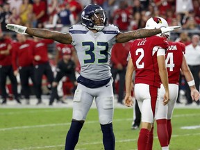 Seattle Seahawks defensive back Tedric Thompson celebrates a missed field goals by Arizona Cardinals kicker Phil Dawson during their Sept. 30, 2018 NFL game in Glendale, Ariz. The Seahawks won 20-17.
