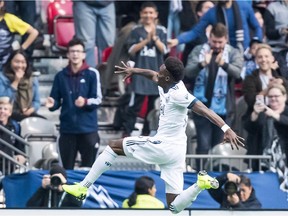 Alphonso Davies celebrates his first goal against the Portland Timbers during the first half on Sunday.