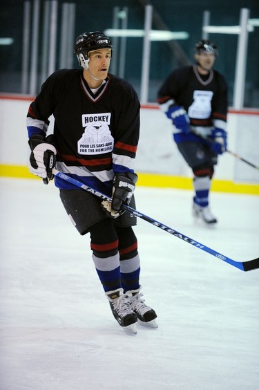 Vancouver mayor Gregor Robertson put on the blades and played hockey for charity at the UBC Thunderbird Winter Sports Center on Feb. 20, 2009.