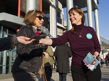 Candidate for mayor of Vancouver Shauna Sylvester campaigns at Quebec and Terminal Oct. 19, 2018.