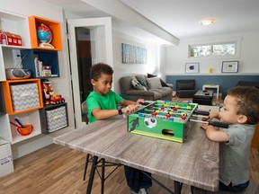 Sharon Smith’s renovated playroom has become a fun refuge for her two boys, Nateo, left, and Huxley.