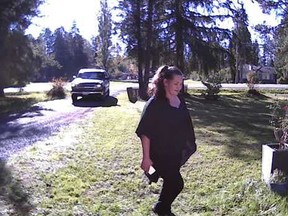 A surveillance camera caught this woman swiping a parcel off Courtney Thomas's porch in Langley.