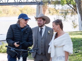 Legendary Beatle Paul McCartney photo bombed a Winnipeg couple as they posed for their wedding photos on Saturday. McCartney, in town for a stop on his “Freshen Up” tour, was cycling near Waterfront Drive in Winnipeg with his bodyguards when he stumbled upon a couple getting their wedding photos taken.